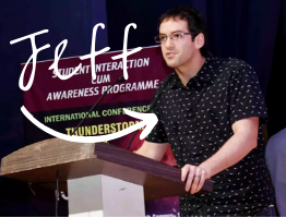 An image of Earth Networks Lightning Scientist, Jeff Lapierre, presenting at an international conference wearing a shirt with little lightning bolts on it